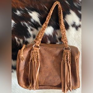 Leather handbag with fringe
